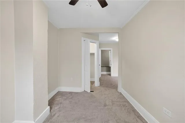 a view of a big room with a door