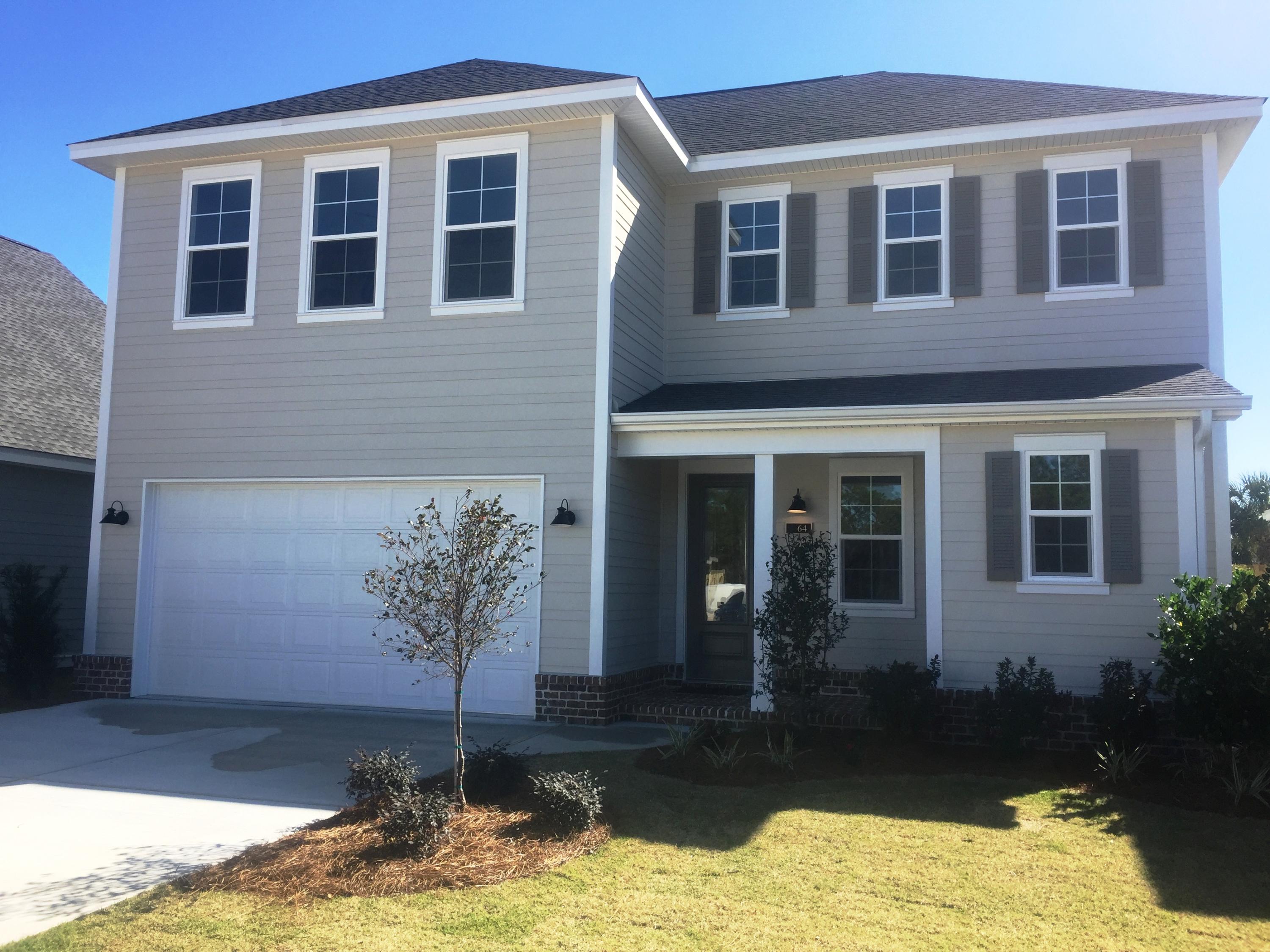 64 Chapman Street Santa Rosa Beach, FL 32459 - Photo 1 of 31 a front view of a house