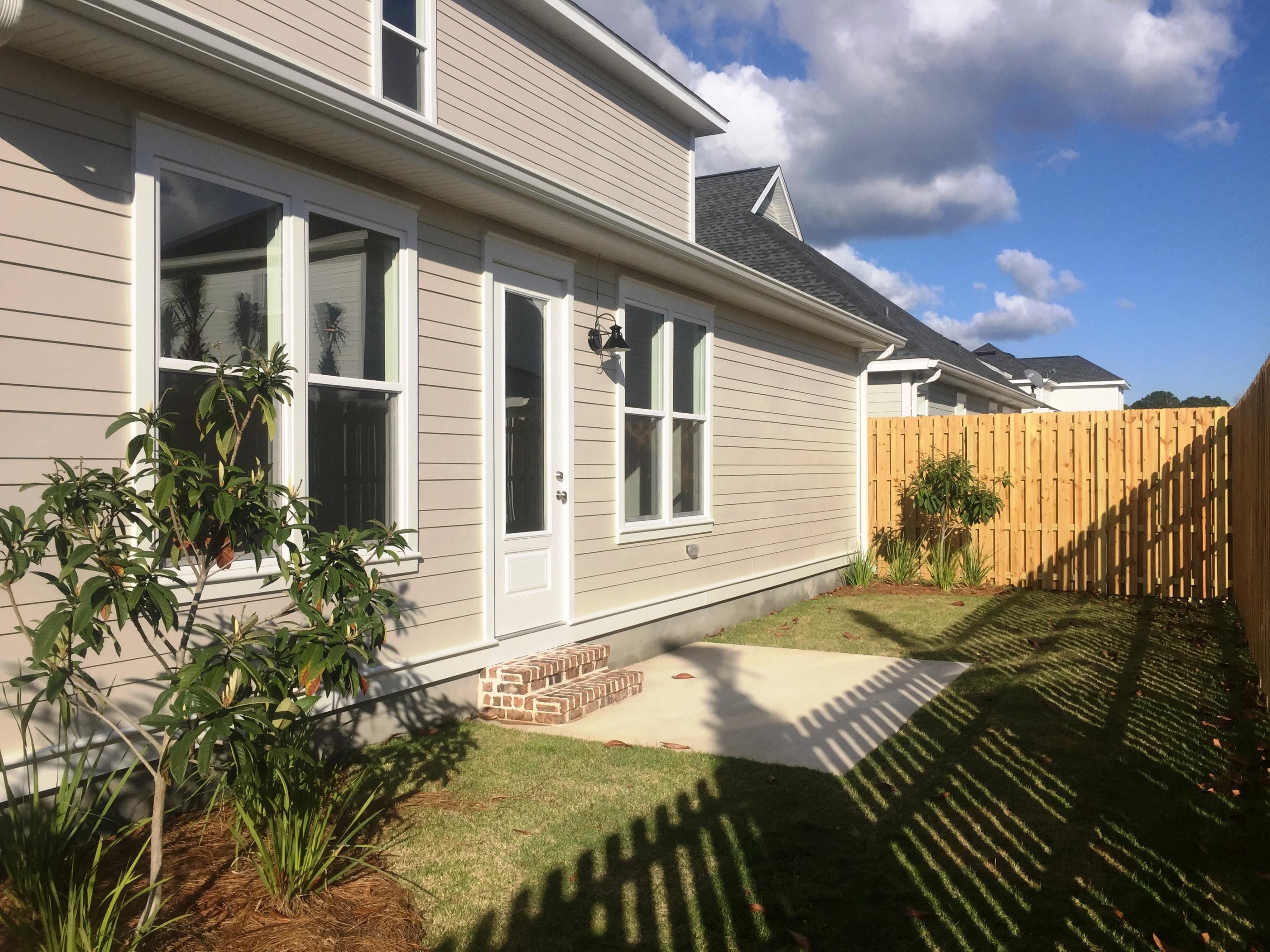 64 Chapman Street Santa Rosa Beach, FL 32459 - Photo 25 of 31 a view of backyard of the house