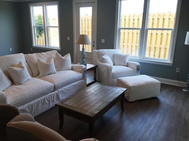 64 Chapman Street Santa Rosa Beach, FL 32459 - Photo 6 of 31 a living room with furniture and a window
