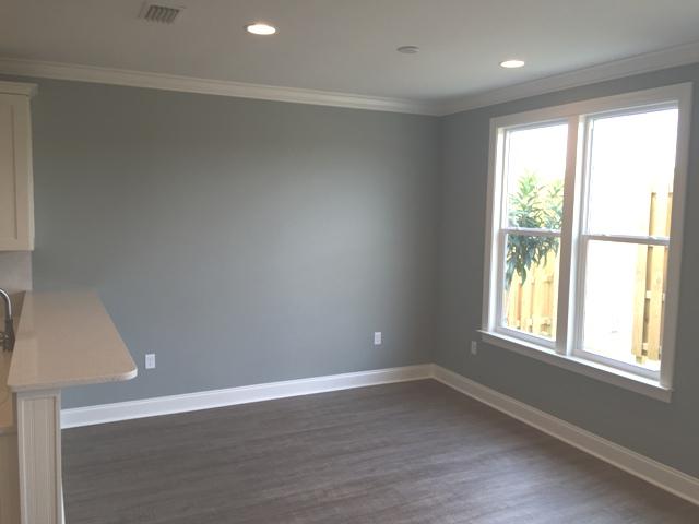 64 Chapman Street Santa Rosa Beach, FL 32459 - Photo 9 of 31 an empty room with wooden floor and windows