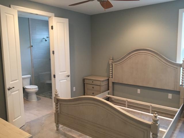 64 Chapman Street Santa Rosa Beach, FL 32459 - Photo 10 of 31 a bedroom with a bed and a toilet