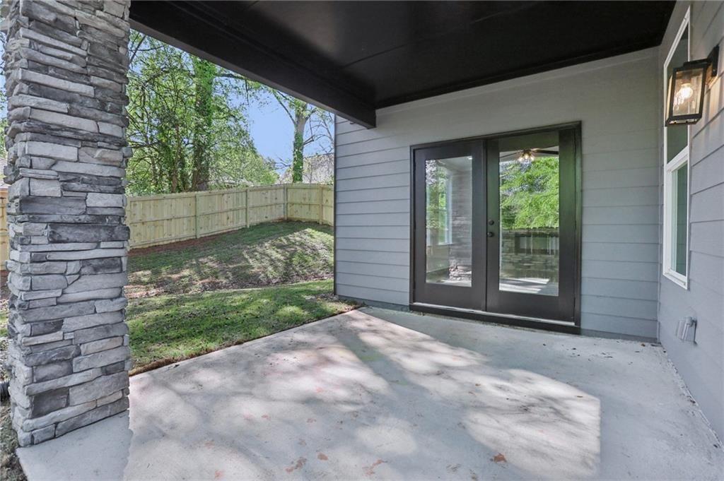 992 Coleman Street Southwest Atlanta, GA 30310 - Photo 18 of 18 a view of a yard with brick walls