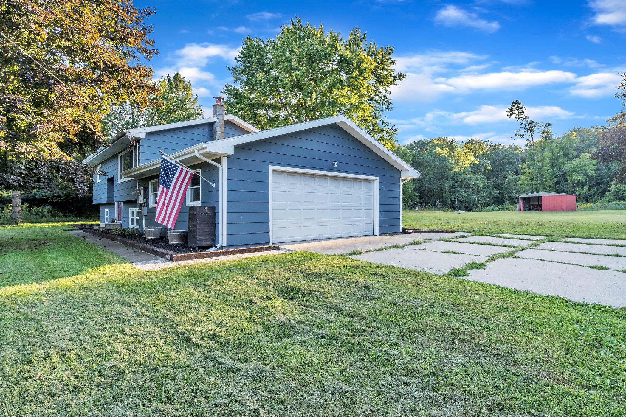 12700 Gates Road Cement City, MI 49233 - Photo 2 of 44 12700-Gates-Rd-WindowStill-Real-Estate-P