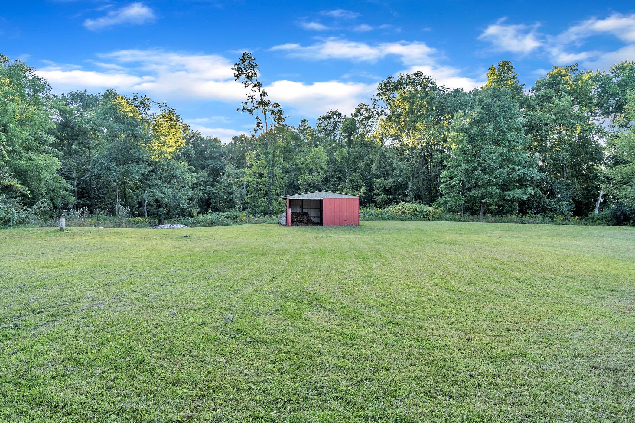 12700 Gates Road Cement City, MI 49233 - Photo 42 of 44 12700-Gates-Rd-WindowStill-Real-Estate-P