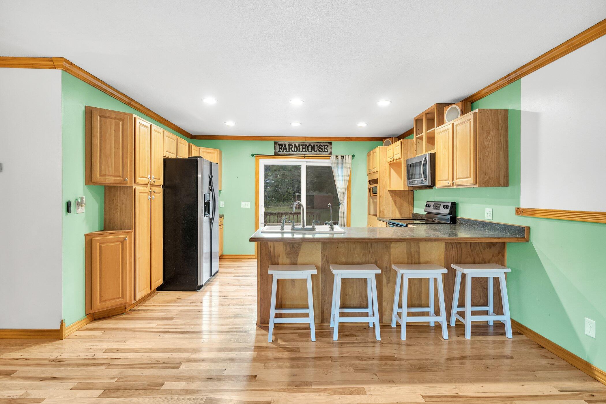 12700 Gates Road Cement City, MI 49233 - Photo 5 of 44 12700-Gates-Rd-WindowStill-Real-Estate-P