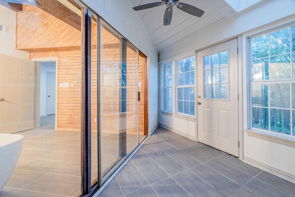 598 Stagecoach Trail Denison, TX 75021 - Photo 17 of 29 a view of a hallway with windows