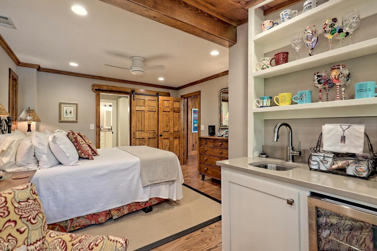 728 Oscar Rock Road Clayton, GA 30525 - Photo 13 of 40 a bedroom with a bed and a dresser