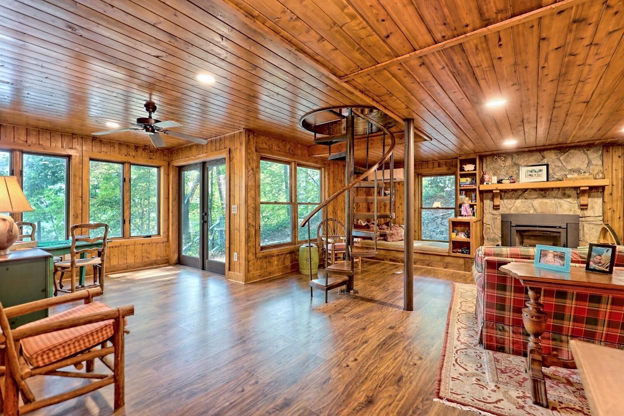 728 Oscar Rock Road Clayton, GA 30525 - Photo 18 of 40 a view of a livingroom with furniture wooden floor and a sink