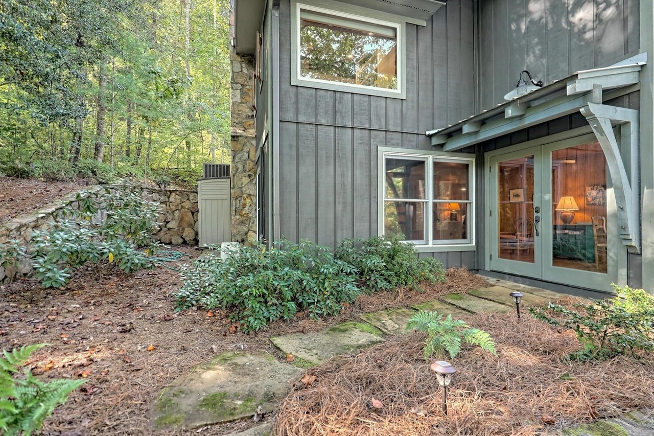728 Oscar Rock Road Clayton, GA 30525 - Photo 24 of 40 a front view of a house with garden