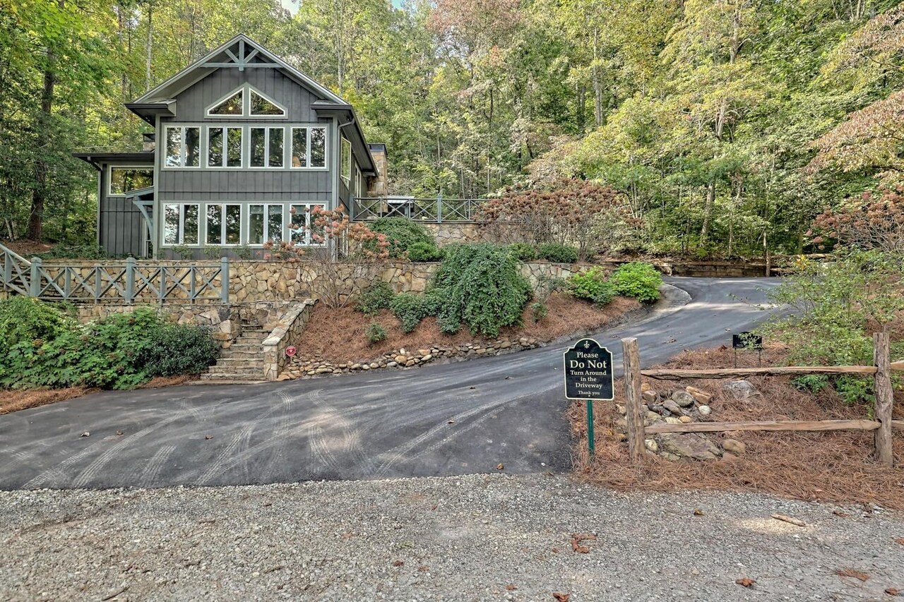 728 Oscar Rock Road Clayton, GA 30525 - Photo 27 of 40 a front view of a house with a yard