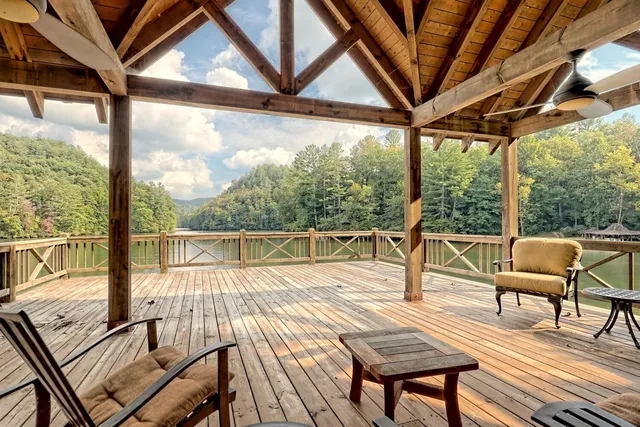 a view of a patio with wooden floor