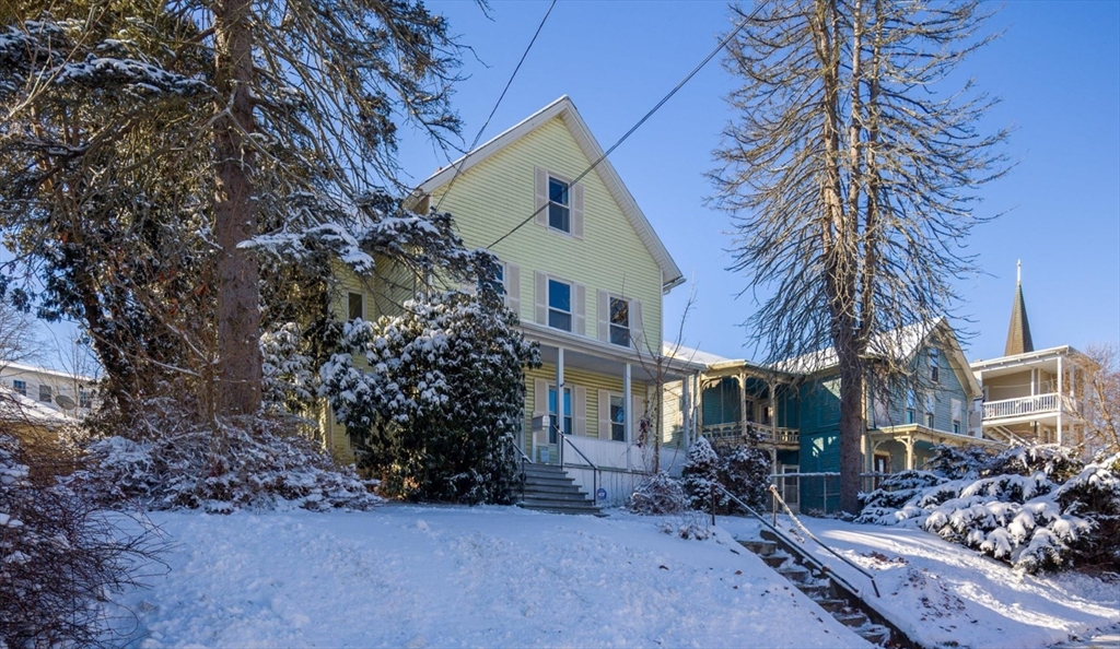 207 Hamilton Street Southbridge, MA 01550 - Photo 2 of 39 a front view of a house with garden