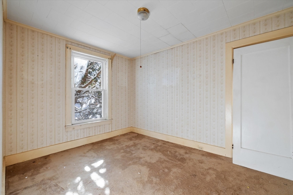 207 Hamilton Street Southbridge, MA 01550 - Photo 24 of 39 a view of an empty room with a window