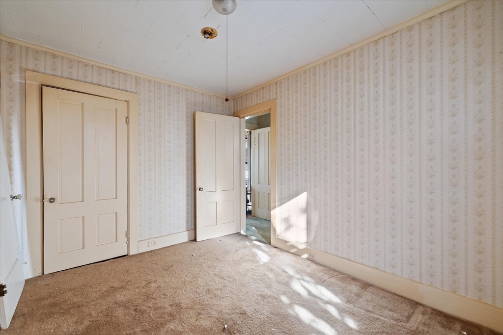 207 Hamilton Street Southbridge, MA 01550 - Photo 25 of 39 a view of an empty room and a window