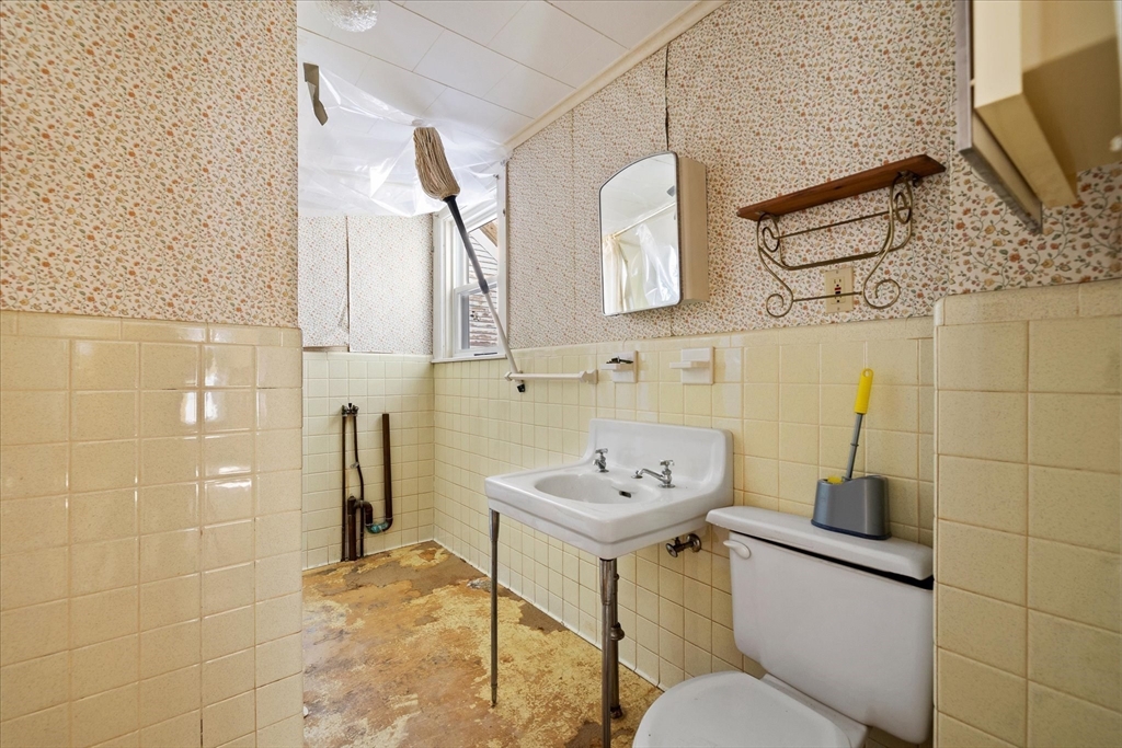 207 Hamilton Street Southbridge, MA 01550 - Photo 26 of 39 a bathroom with a sink toilet and shower