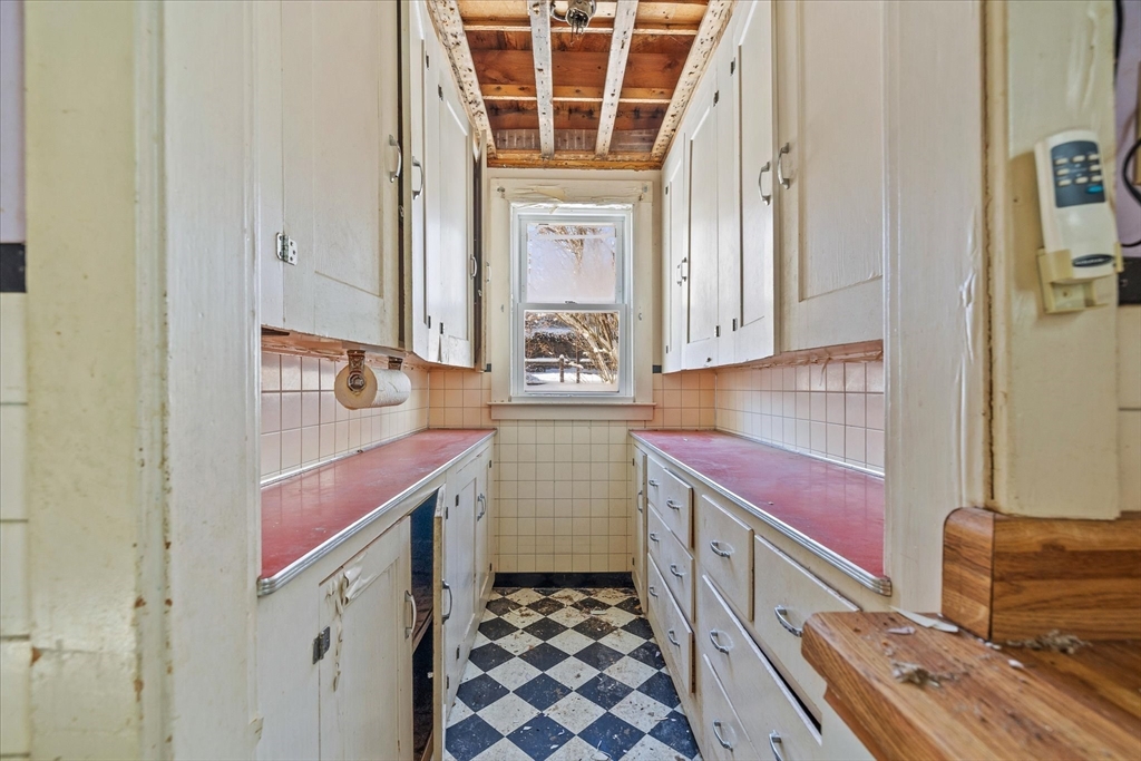 207 Hamilton Street Southbridge, MA 01550 - Photo 4 of 39 a kitchen with a stove and a microwave
