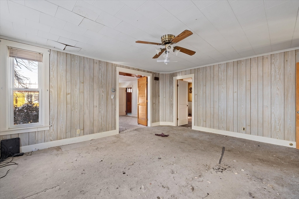 207 Hamilton Street Southbridge, MA 01550 - Photo 6 of 39 a view of an empty room with a window