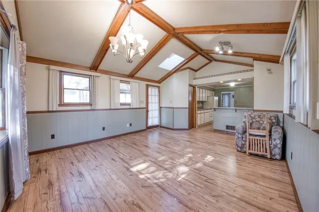 a view of livingroom with furniture wooden floor and a rug