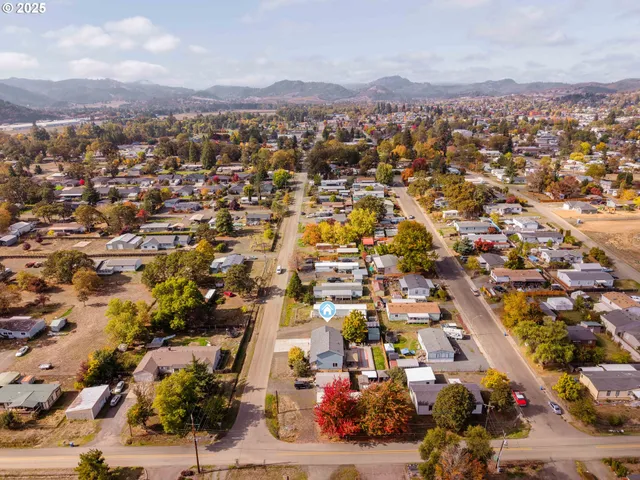 an aerial view of residential building and lake view