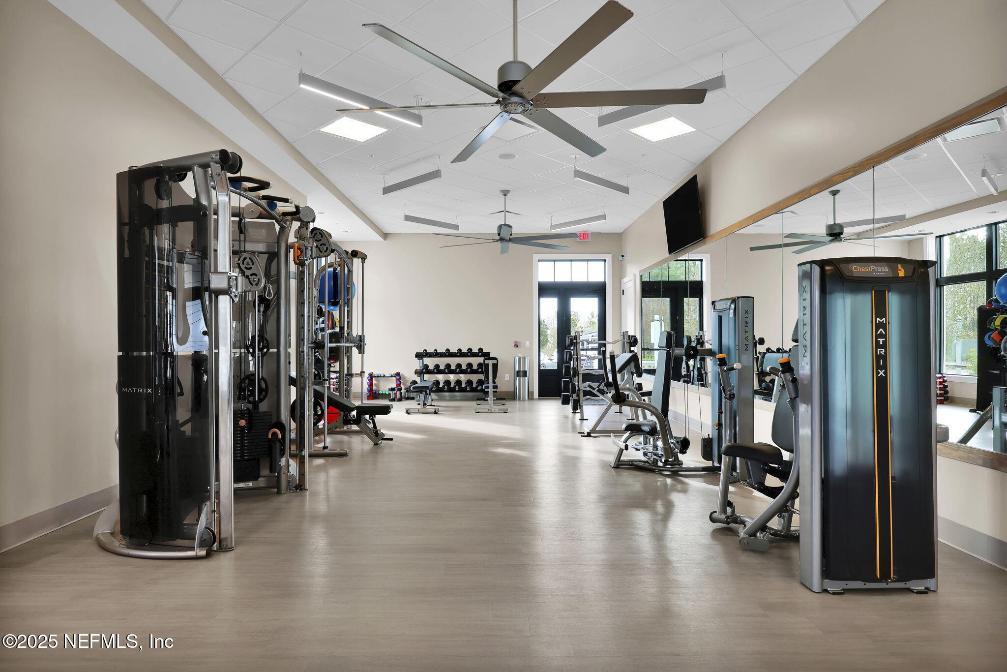 328 Ecliptic Loop Yulee, FL 32097 - Photo 22 of 44 a view of a room with gym equipment