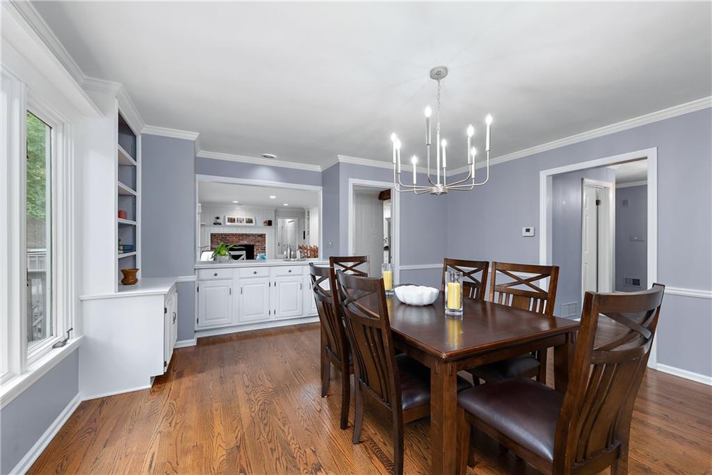 101 Lee Road Sewickley, PA 15143 - Photo 8 of 25 a view of a dining room with furniture and wooden floor