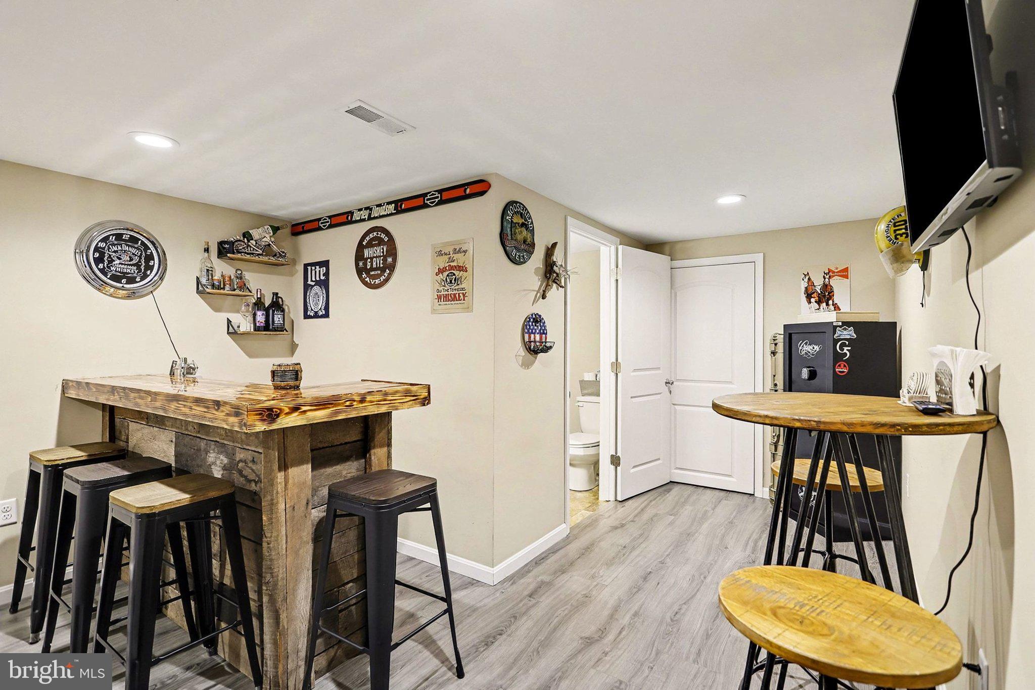 774 Fairview Drive Hanover, PA 17331 - Photo 19 of 32 a view of a dining room with furniture and wooden floor