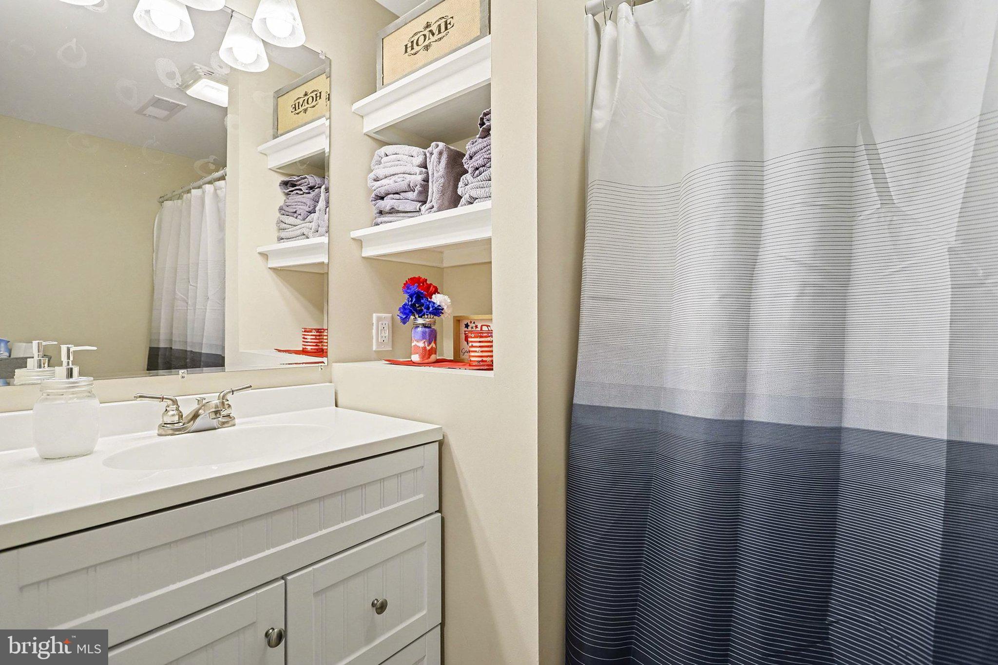 774 Fairview Drive Hanover, PA 17331 - Photo 20 of 32 a bathroom with a sink and a mirror