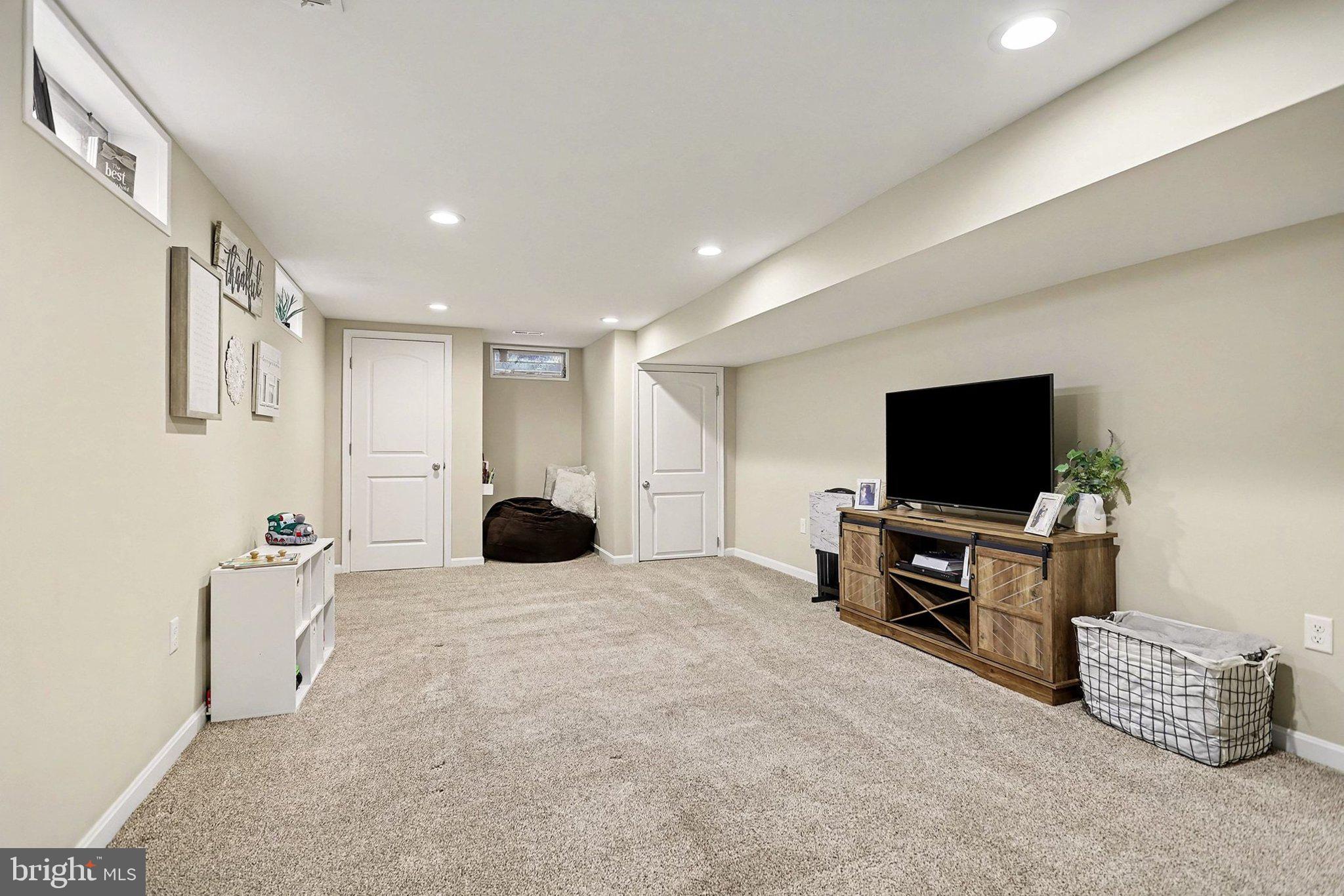 774 Fairview Drive Hanover, PA 17331 - Photo 21 of 32 a living room with furniture and a flat screen tv