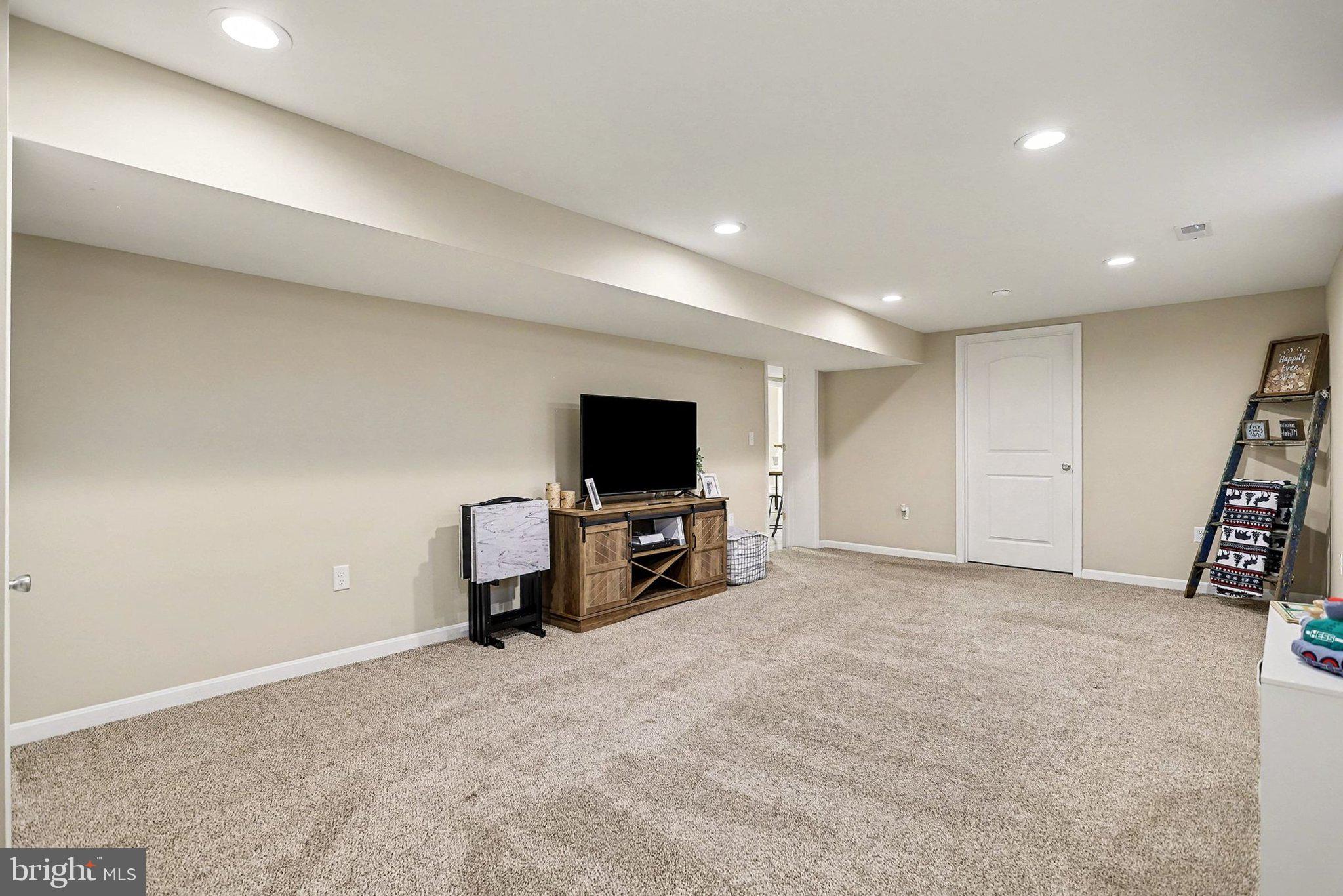 774 Fairview Drive Hanover, PA 17331 - Photo 22 of 32 a living room with furniture and a flat screen tv