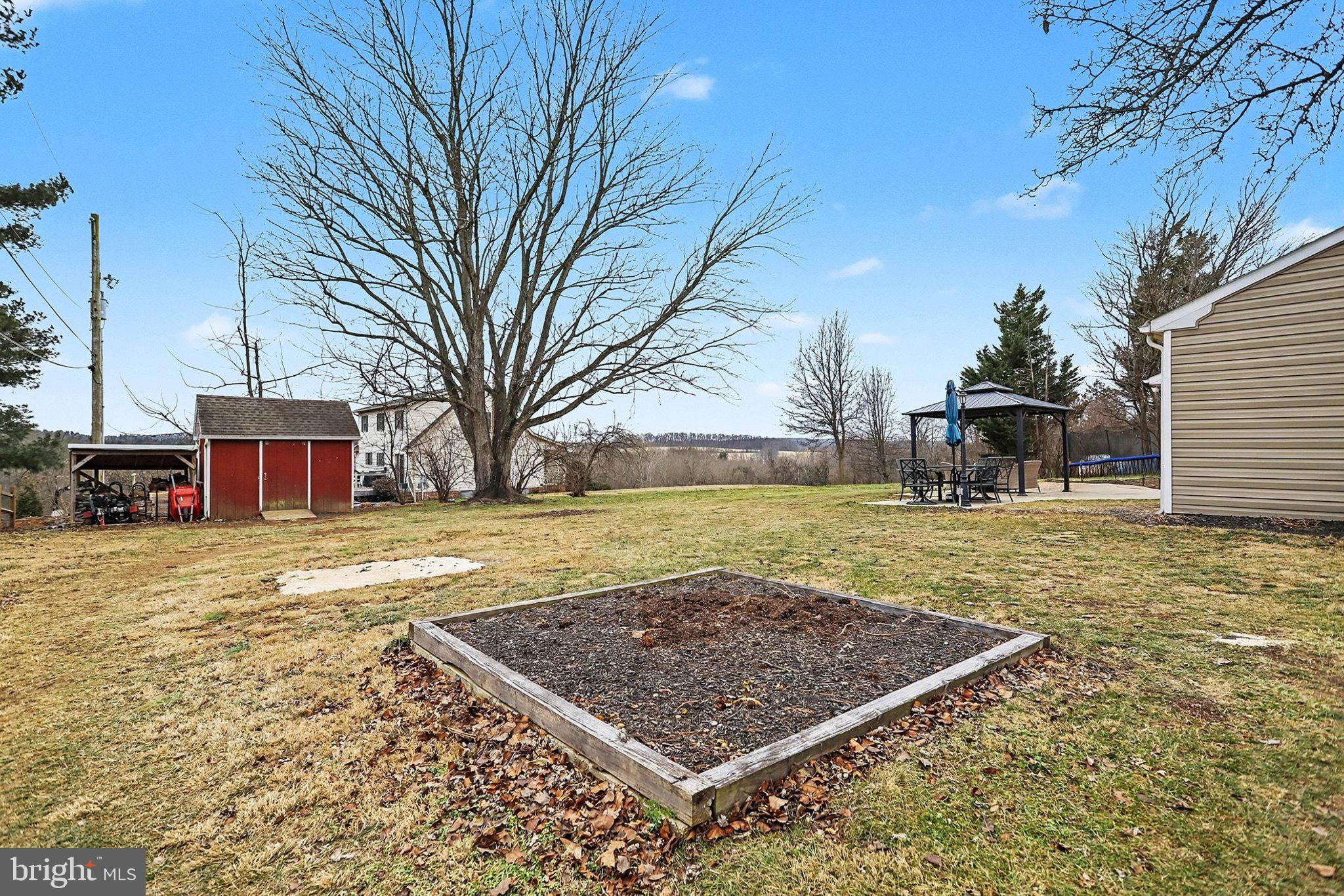 774 Fairview Drive Hanover, PA 17331 - Photo 5 of 32 a view of a yard with a large tree