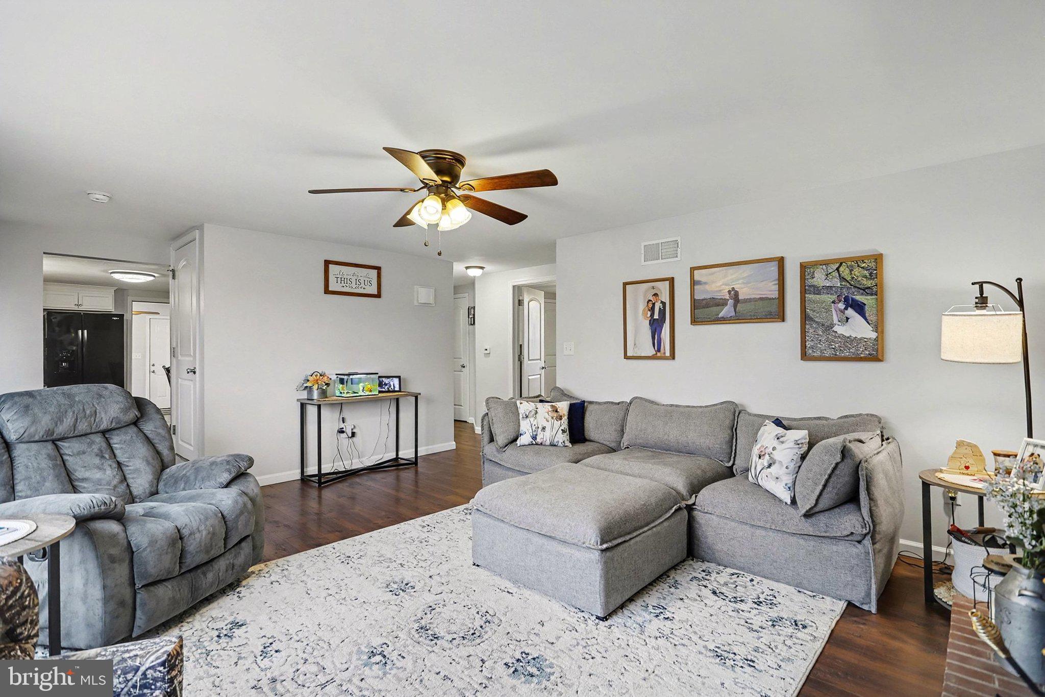 774 Fairview Drive Hanover, PA 17331 - Photo 7 of 32 a living room with furniture and a chandelier