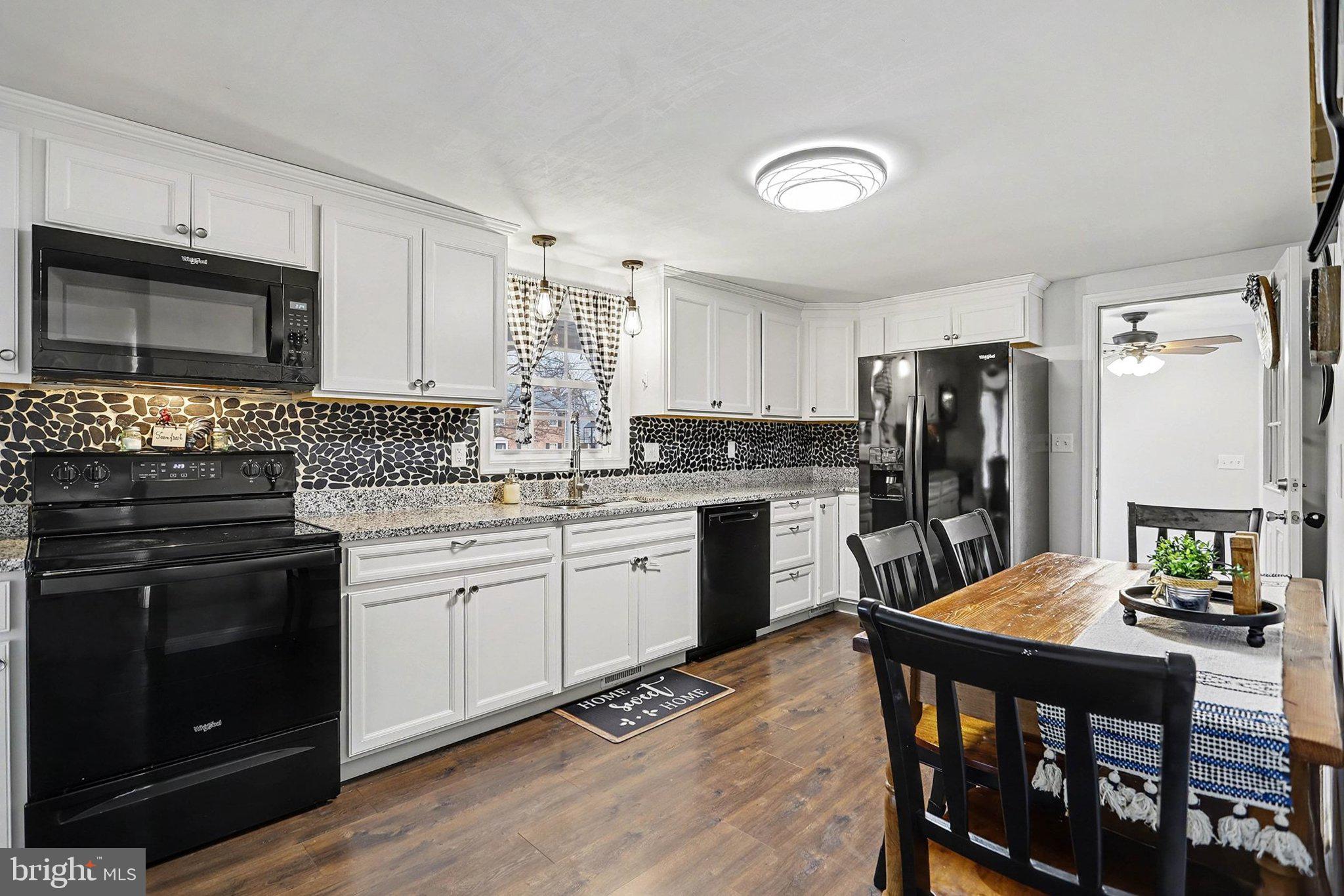 774 Fairview Drive Hanover, PA 17331 - Photo 8 of 32 a kitchen with a stove a sink dishwasher a refrigerator and a microwave