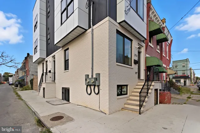 a view of a house with many windows