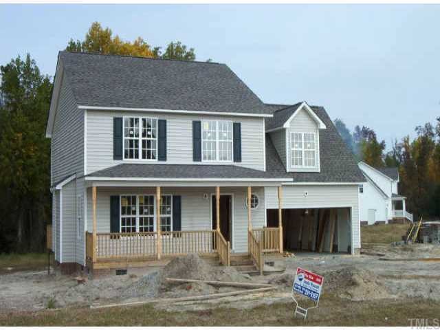 133 Cross Ridge Drive Willow Spring, NC 27592 - Photo 1 of 1 a front view of a house with a yard