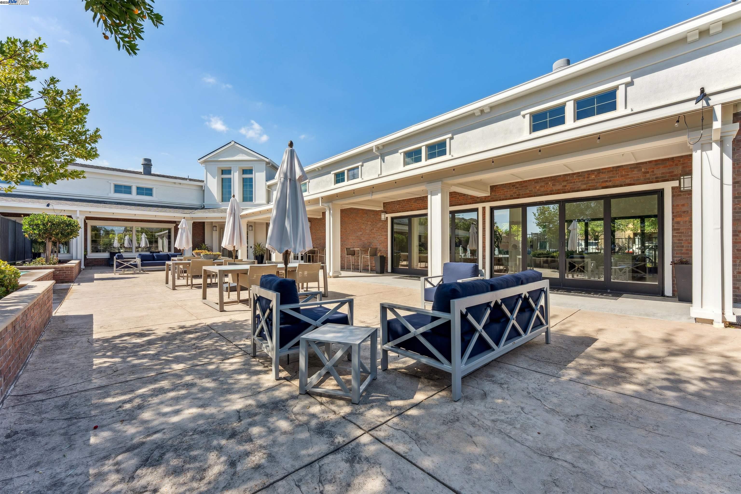 1360 Brookline Loop Pleasanton, CA 94566 - Photo 26 of 29 a building outdoor space with patio furniture and garden