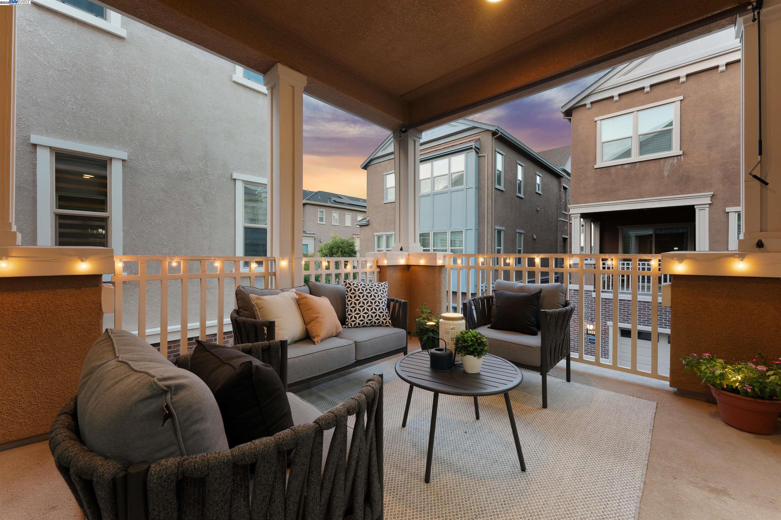 1360 Brookline Loop Pleasanton, CA 94566 - Photo 10 of 29 a living room with furniture and a floor to ceiling window