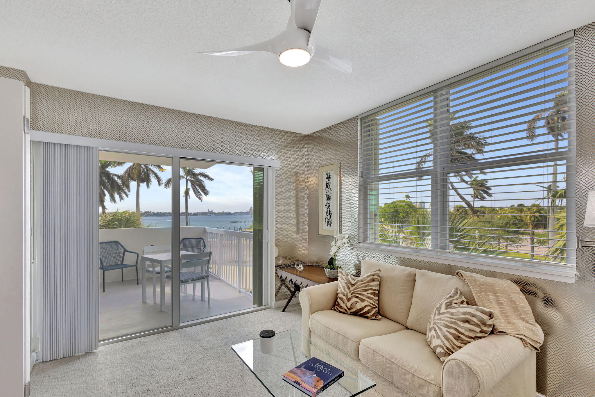 2600 North Flagler Drive, Unit 310 West Palm Beach, FL 33407 - Photo 15 of 42 a living room with furniture and a large window