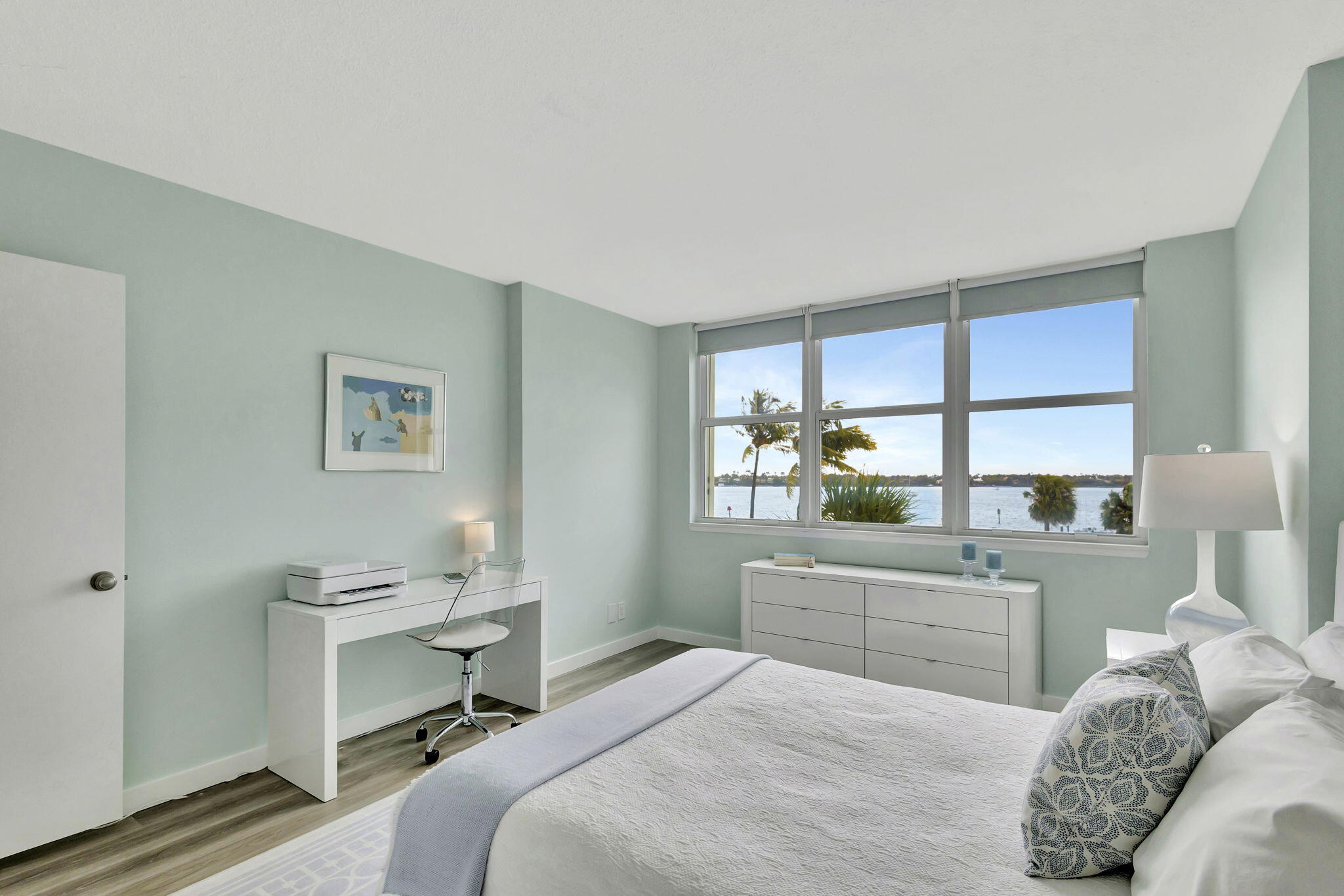 2600 North Flagler Drive, Unit 310 West Palm Beach, FL 33407 - Photo 18 of 42 a bedroom with a bed and a window