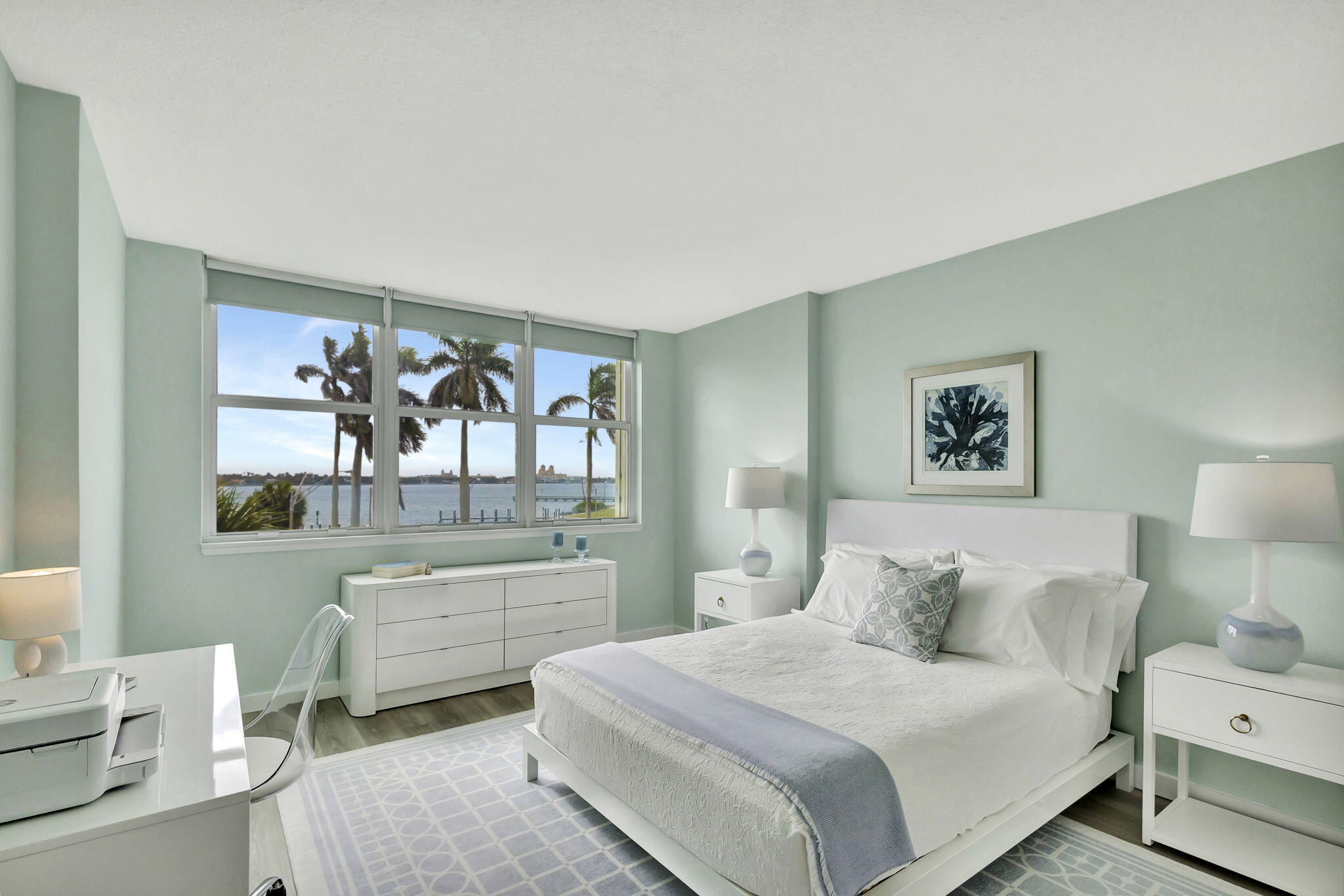 2600 North Flagler Drive, Unit 310 West Palm Beach, FL 33407 - Photo 19 of 42 a bedroom with a bed and a desk