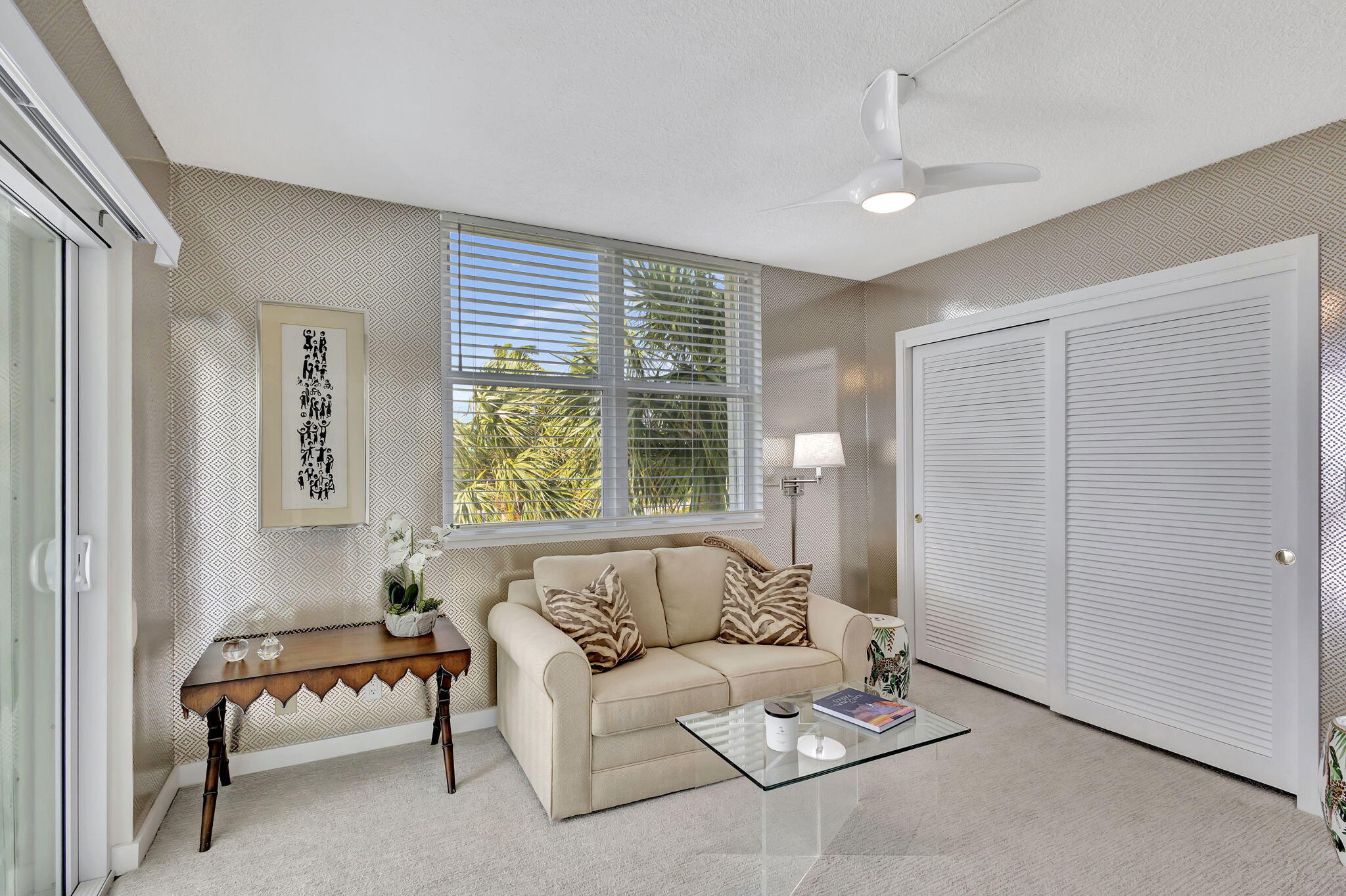 2600 North Flagler Drive, Unit 310 West Palm Beach, FL 33407 - Photo 20 of 42 a living room with furniture and a large window
