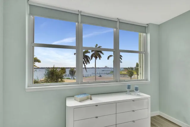 a bathroom with a sink and a window