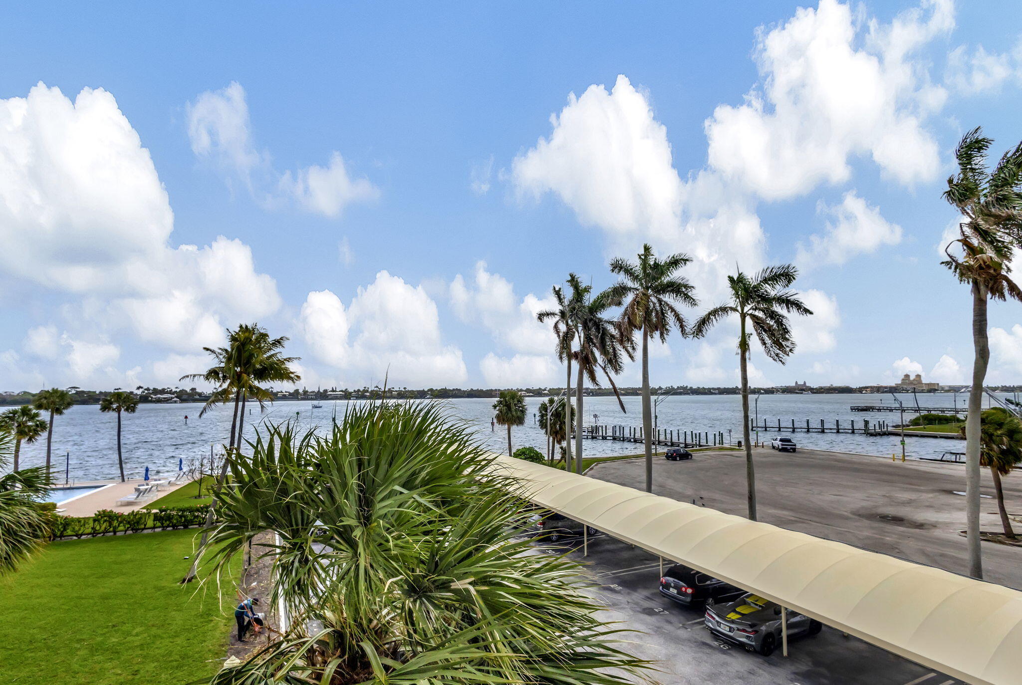 2600 North Flagler Drive, Unit 310 West Palm Beach, FL 33407 - Photo 30 of 42 a view of a swimming pool with a terrace