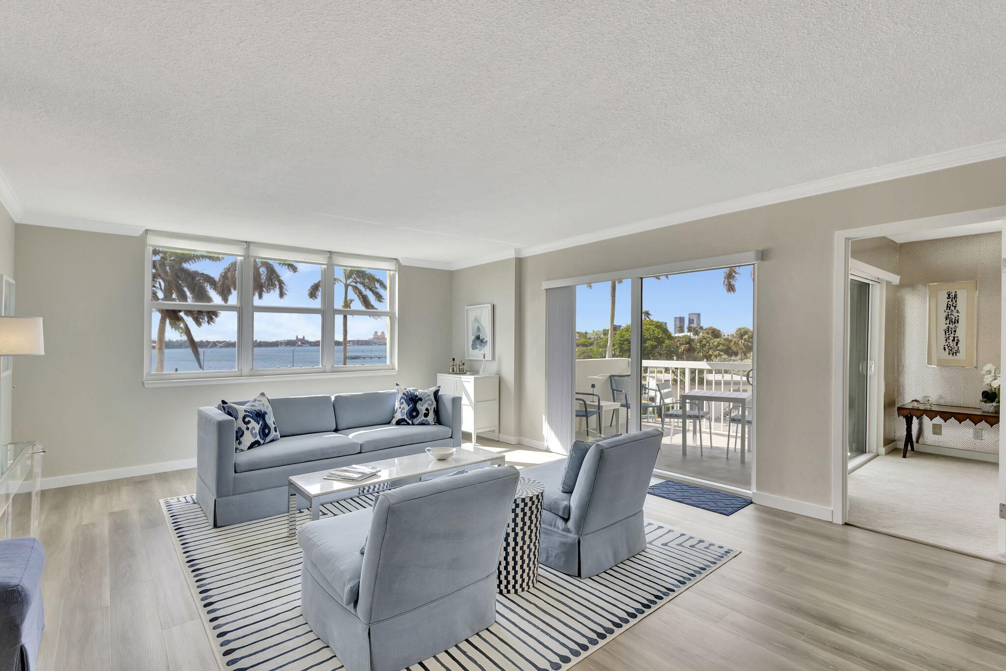 2600 North Flagler Drive, Unit 310 West Palm Beach, FL 33407 - Photo 3 of 42 a living room with furniture and a window