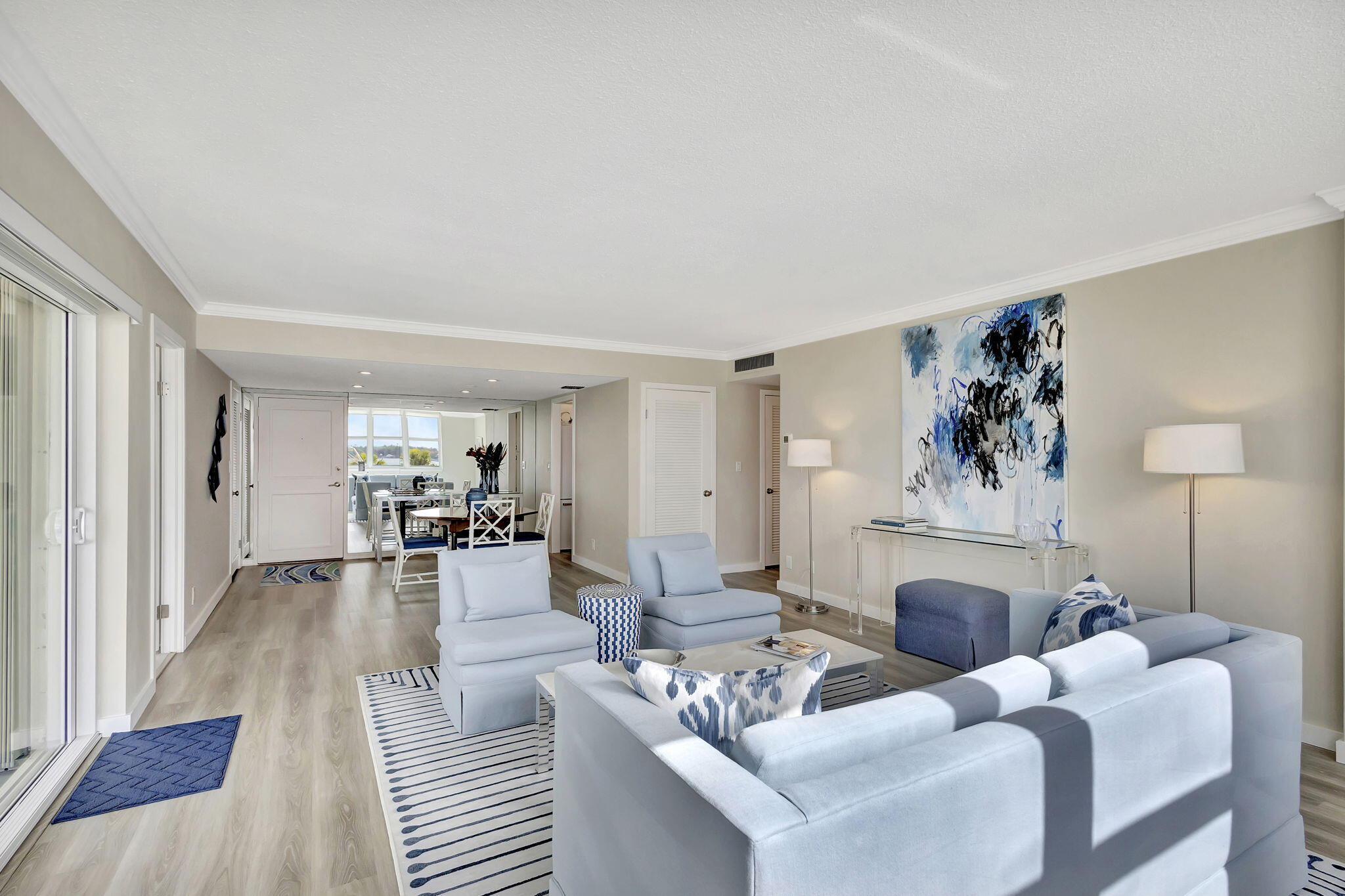 2600 North Flagler Drive, Unit 310 West Palm Beach, FL 33407 - Photo 8 of 42 a living room with furniture and a fireplace