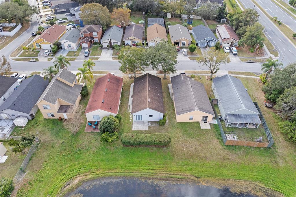 11029 Einbender Road Orlando, FL 32825 - Photo 20 of 27 an aerial view of residential houses with outdoor space and swimming pool