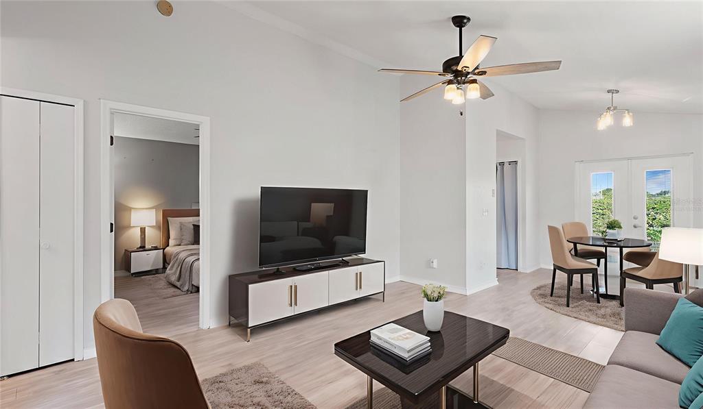 11029 Einbender Road Orlando, FL 32825 - Photo 2 of 27 a living room with furniture and a flat screen tv