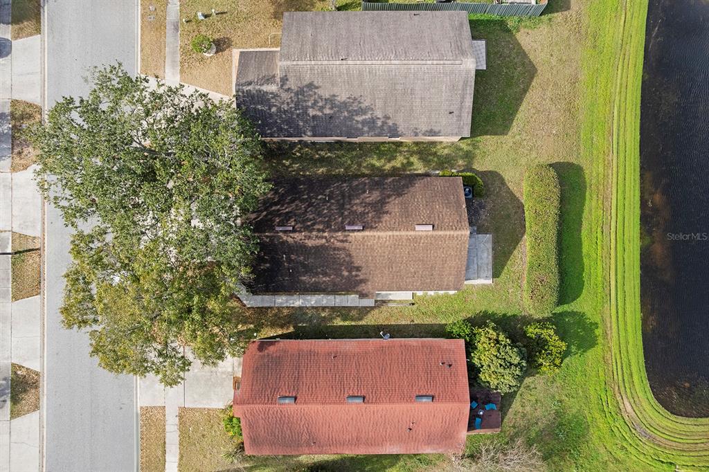 11029 Einbender Road Orlando, FL 32825 - Photo 21 of 27 aerial view of a house with a garden