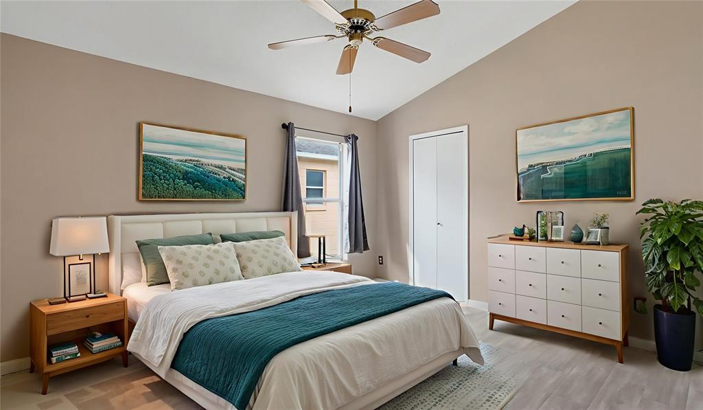 11029 Einbender Road Orlando, FL 32825 - Photo 9 of 27 a bedroom with a bed and a dresser