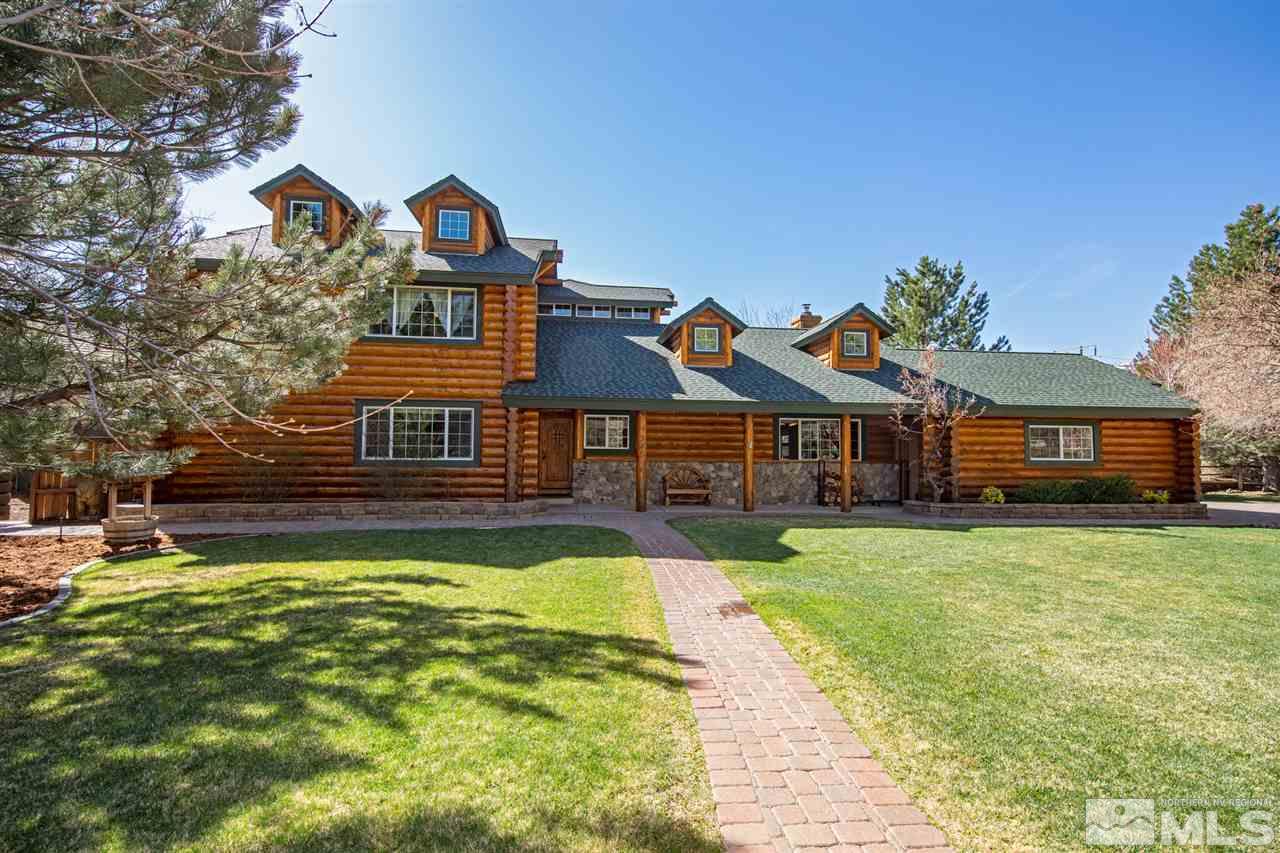 345 Prickly Pear Road Verdi, NV 89439 - Photo 1 of 26 a front view of a house with a yard